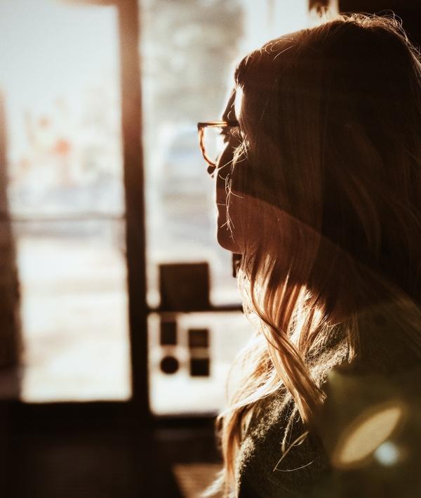 Woman looking at the door