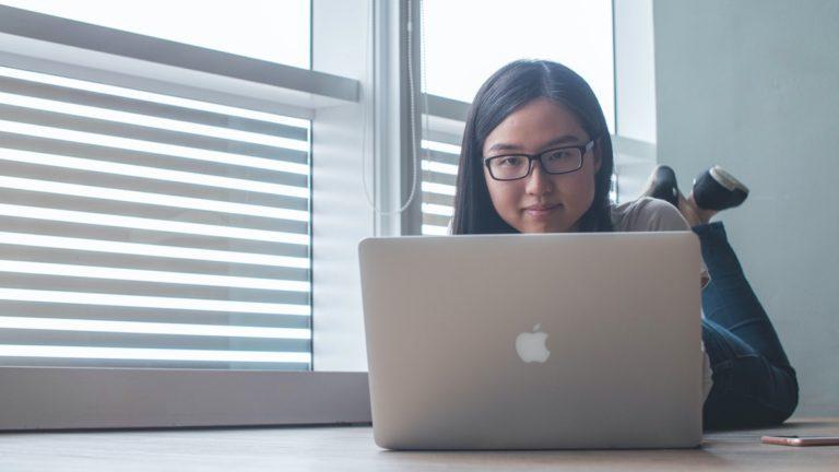 Asian using laptop