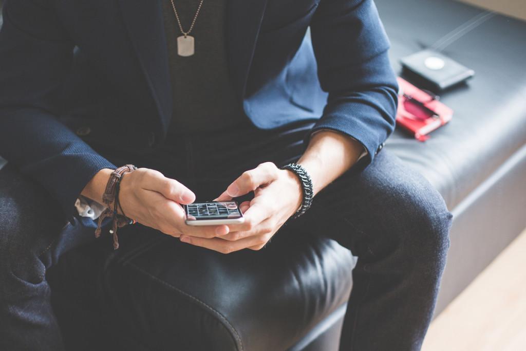 man using his phone