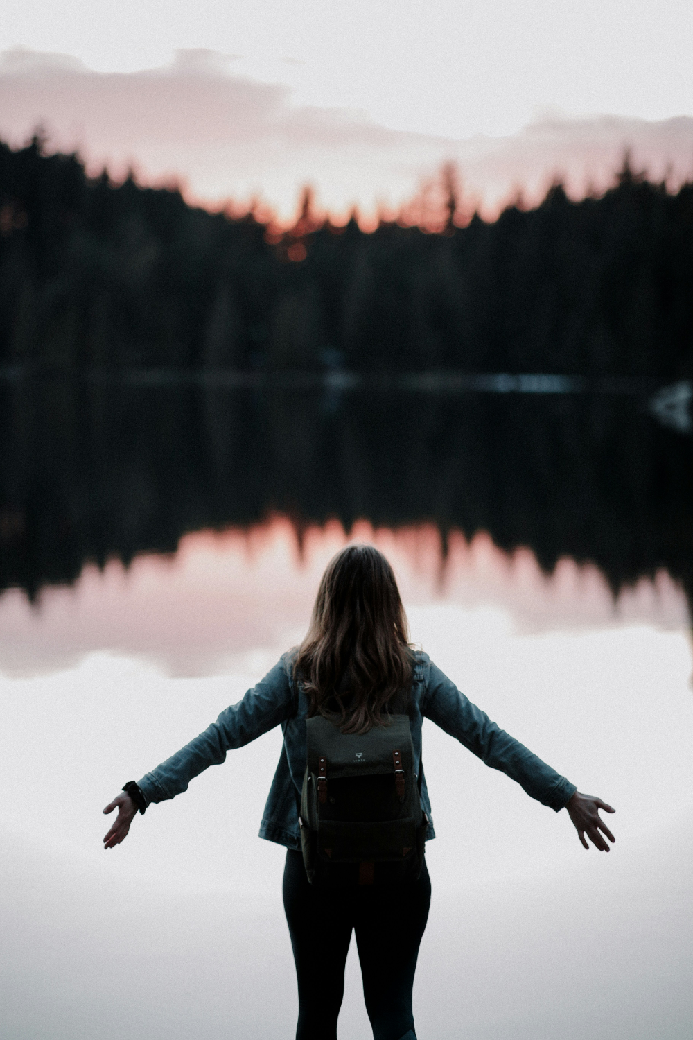 calm woman standing on shore